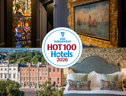 Elegant hotel featuring historic charm, luxurious beds, artistic stained glass, and stunning city views. Award-winning stay.